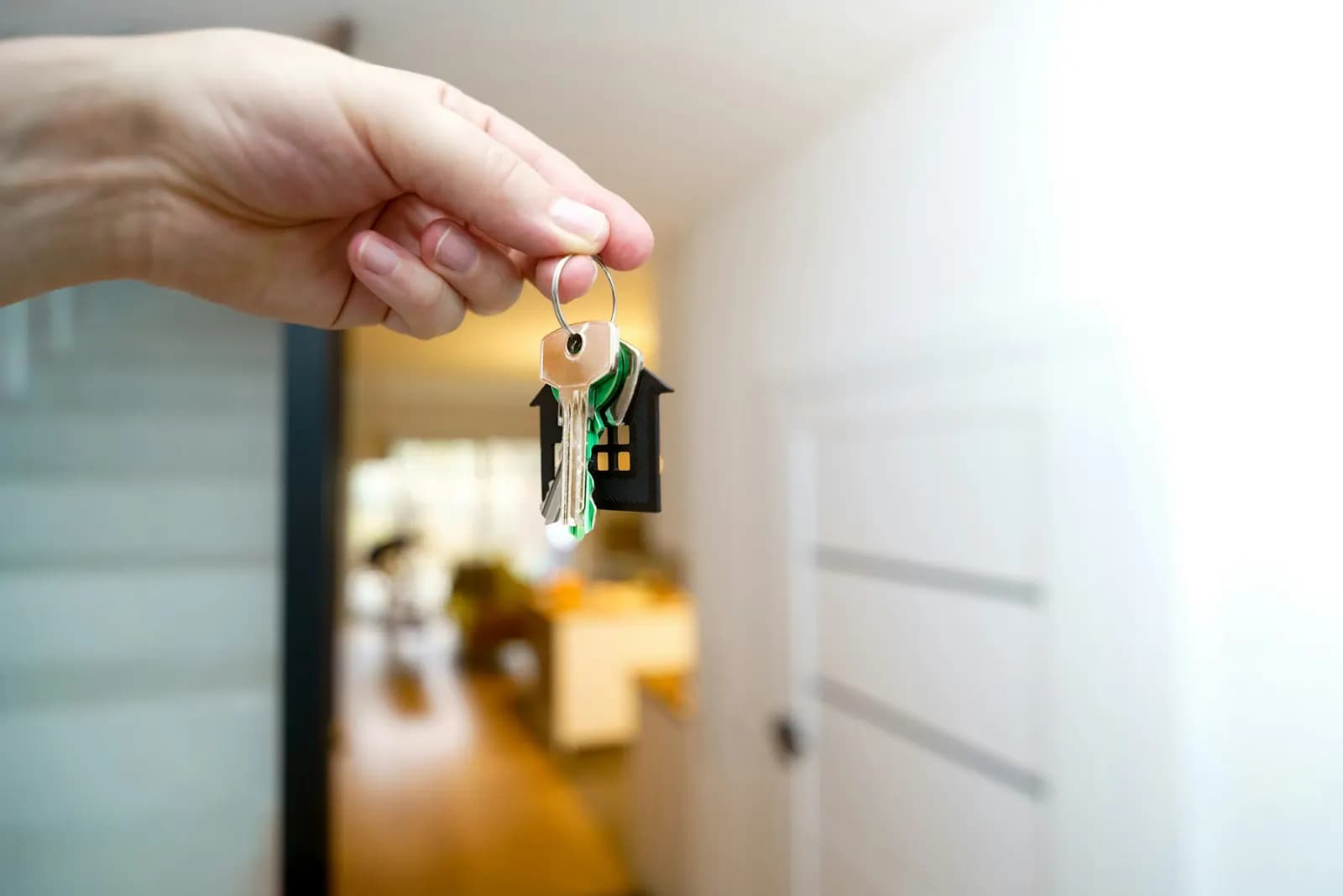 House keys held inside a home entryway