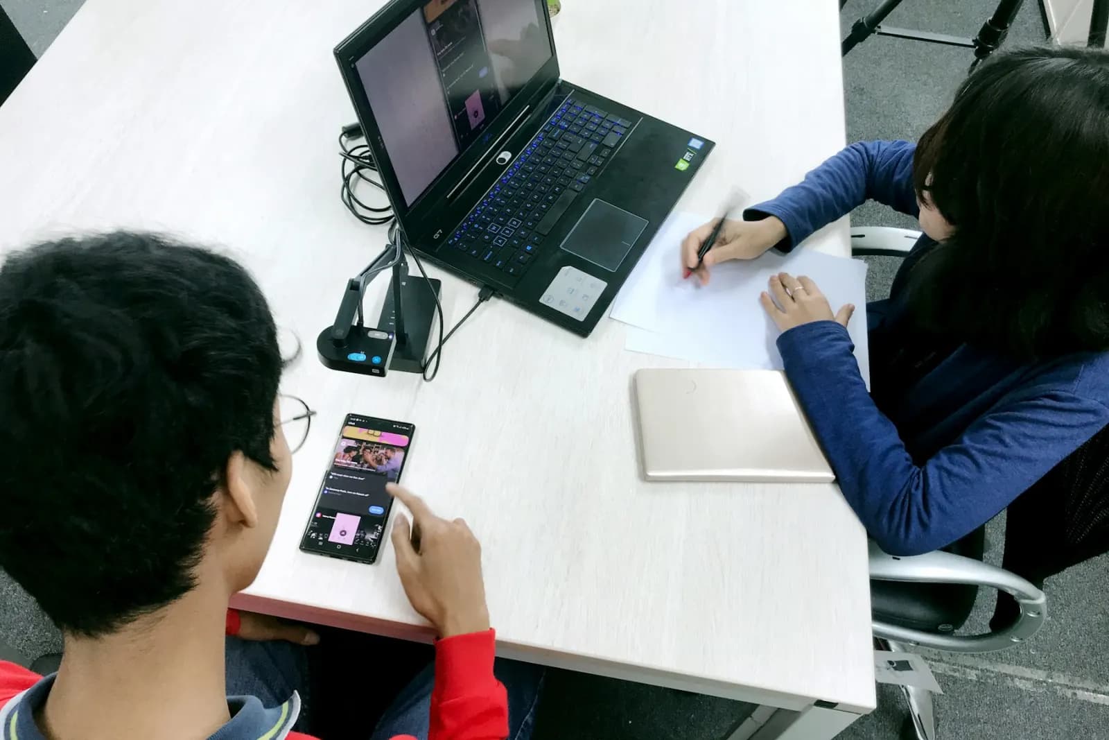 User testing session with a participant using a laptop